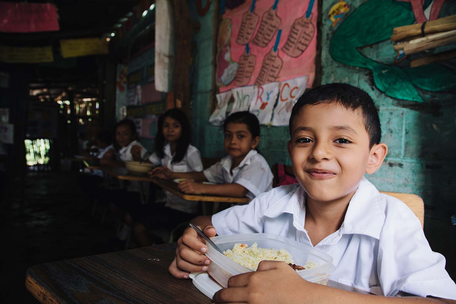 Kid in school eating lunch